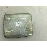 A hallmarked silver cigarette case