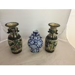 A pair of Chinese vases; together with a blue and white Moon vase with four characters to the base,