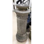 A stone sundial on column base