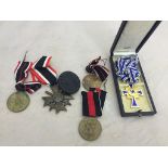 Six German medals to inc a cased Mother's Cross, Wounds Badge,