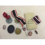 Nine WWII German badges,