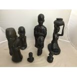 A quantity of early 20th century carved tribal figures;