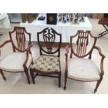 A pair of shieldback carver chairs;