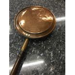 A 19th/20th century copper bed pan