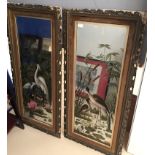 A pair of gilt framed mirrors,