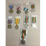 A quantity of US military medals and DMs