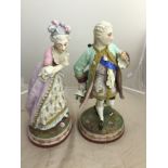 A pair of large 19th century Continental figures: "Nobleman and Lady"