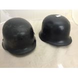 Two Polish military helmets