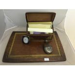 A stationery box; togethers with pens, hip flask,