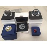 Four boxed Swarovski plaques;