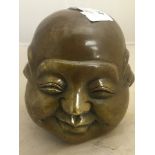 A bronze four-faced Buddha;