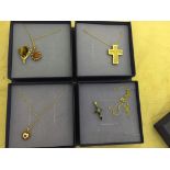 Five gold pendants