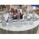 A quantity of glass decanters