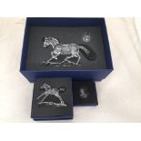 A boxed Swarovski Esperanza horse,