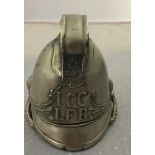 An inkwell in the form of an LCC LFB Fire Brigade helmet