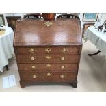 A George III oak fall-front bureau