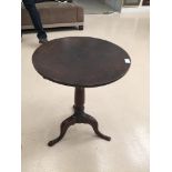 A 19th century mahogany tilt-top table