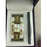 A ladies Ingersoll gem exotic watch set with garnets