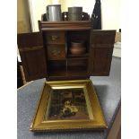 A 1930's oak smoker's cabinet crystoleum;