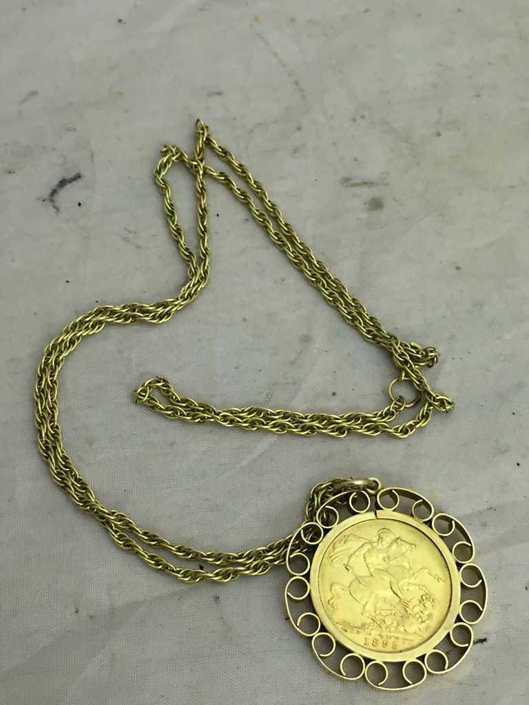 A Melbourne Mint 1895 sovereign in pendant on gold chain