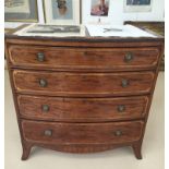 A George III mahogany four-drawer chest of drawers