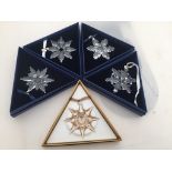 Five boxed Swarovski Christmas decorations: 2006, 2008, 2009, 2012,