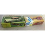 Two vintage boxed tin plate cars