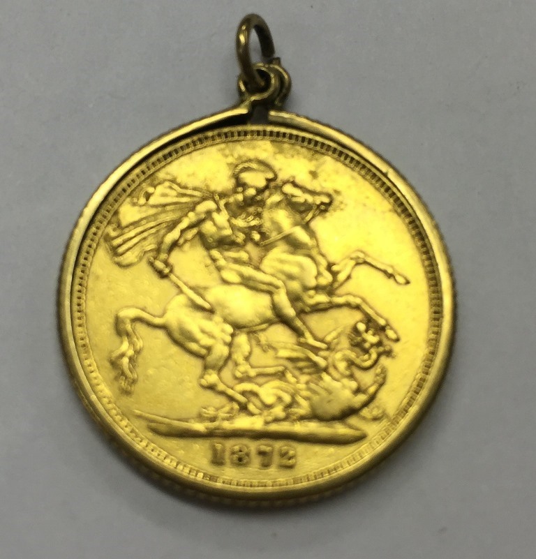 An 1872 London Mint sovereign in 9ct mount