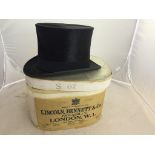 A boxed top hat by Bennett Lincoln & Co