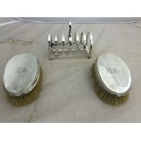 A hallmarked silver toast rack;