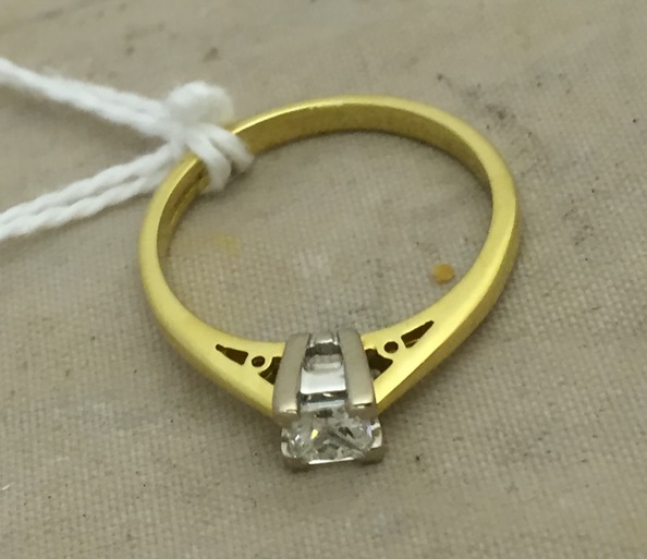 An 18ct princess cut diamond solitaire