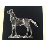 A boxed Swarovski horse