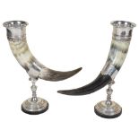 A Pair of Silver-Plated Horn Vases: Large cow horns set in silver plated mounts,