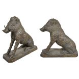 A Large Pair of Bronze Seated Tusked Boar,