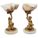 A Pair of 19th Century Cherub and Shell Bon Bon Dishes: Set with shells to the top held aloft by a