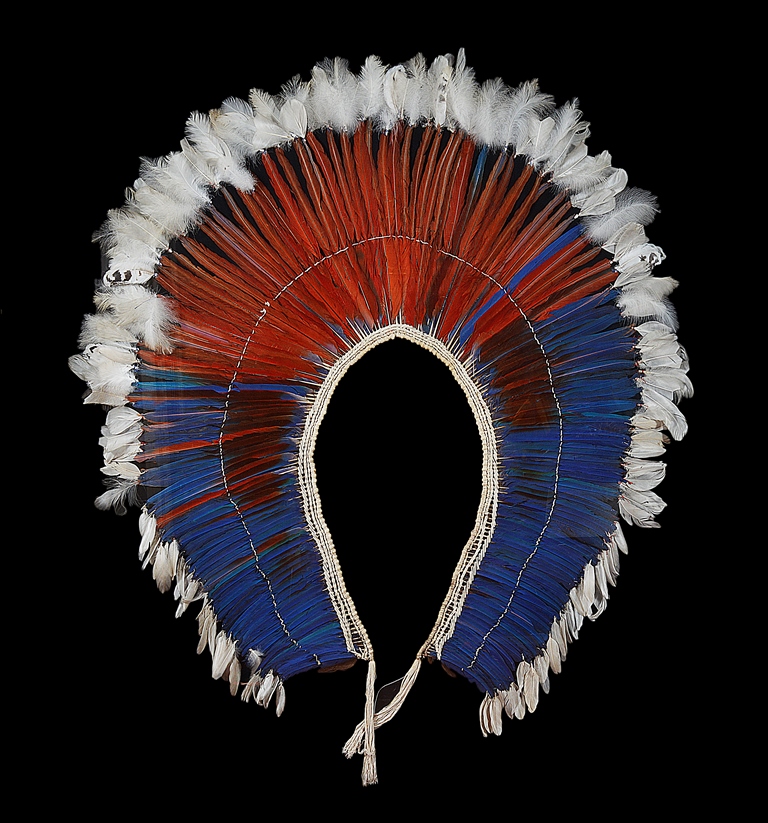 A Brazilian Kayapo Tribe Feather Headdress: Framed and glazed,