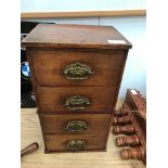 A miniature chest of drawers