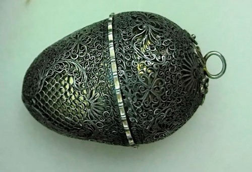 An 18th/19th century Oriental silver filigree egg cup and cover pendant,