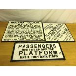 Three cast iron railway signs