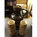 A large brown German pottery jug;