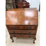 A walnut fallfront bureau