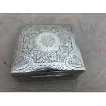 A hallmarked silver cigarette box