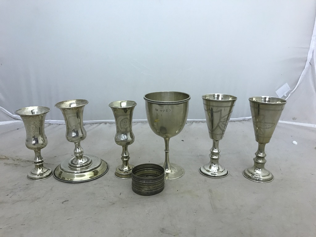 Five hallmarked silver Kiddush cups;