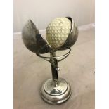 A hallmarked golfing trophy of a hole in one ball holder "7th Hole at Addington Palace Golf Club: