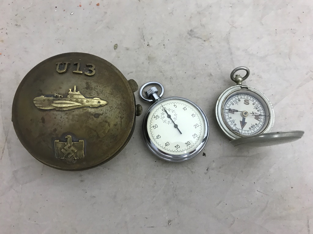 A Military stopwatch and compass