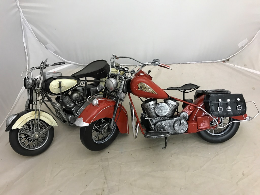 Two tin-plate motor bikes