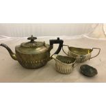 A late Victorian oval teapot with fluted sides,