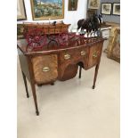 An Edwardian mahogany sideboard