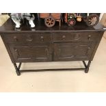 A 1940s oak sideboard