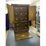 A walnut sewing cabinet & contents